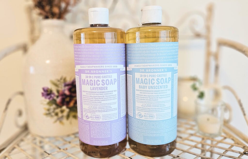 Two bottles of Dr. Bronner's liquid castile soap. One is lavender and one is unscented.