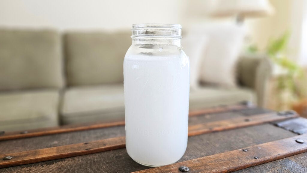 Half gallon mason jar filled with homemade liquid fabric softener.