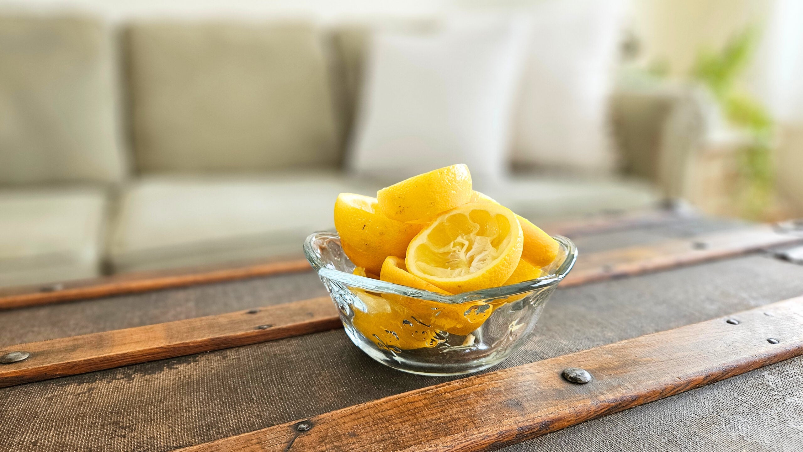 Glass bowl of lemon rinds.