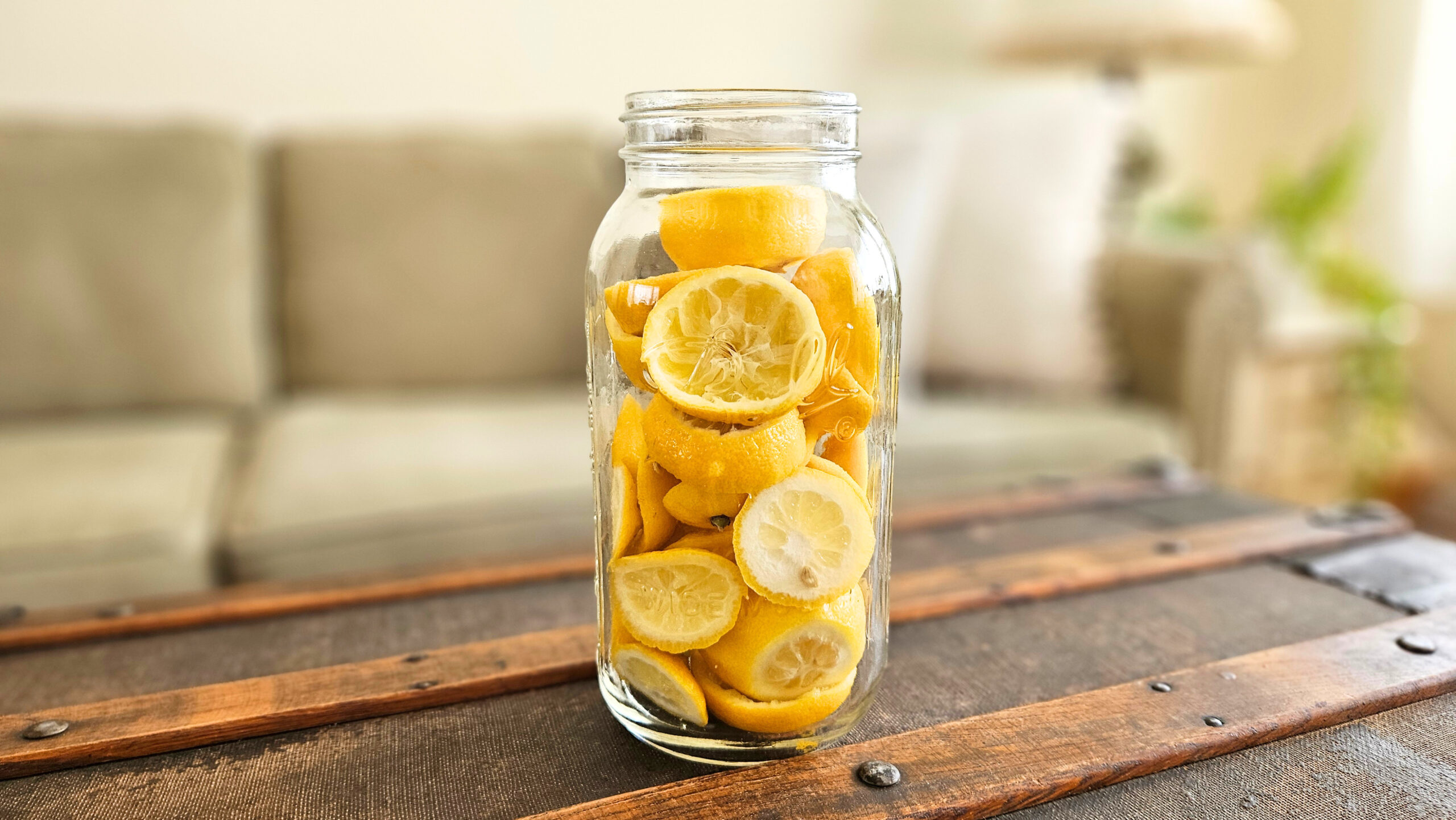 Half gallon mason jar of lemon rinds.