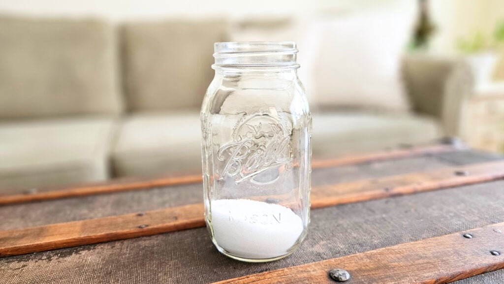Quart size mason jar with baking soda and xylitol.