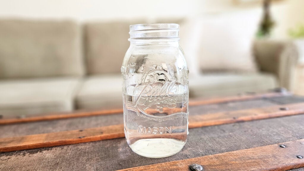 Quart size mason jar with baking soda, xylitol, and water.